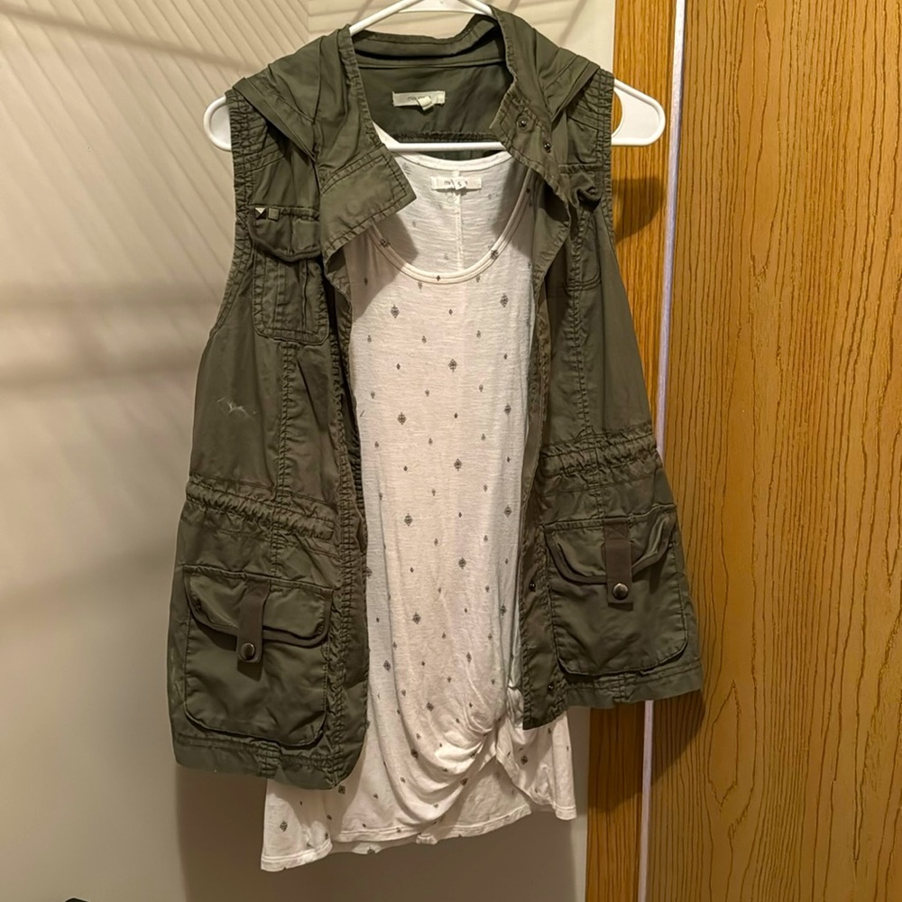 Maurice’s tank top and Jacket vest